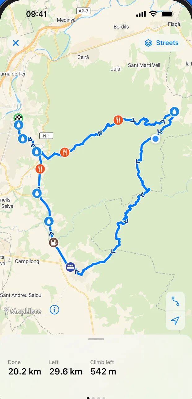 A route on Ridekit's full-screen map, with stops and the distance done and left